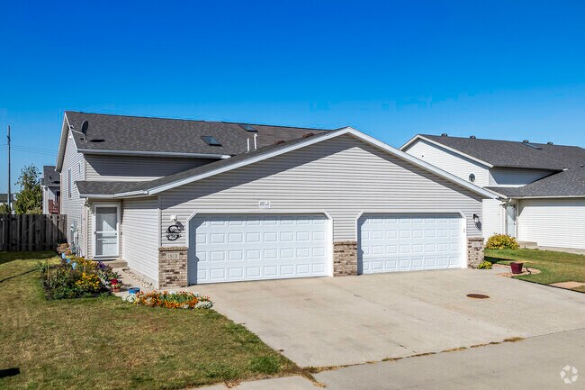 This twin home offers 2-car garage and ample parking in Willow Park.