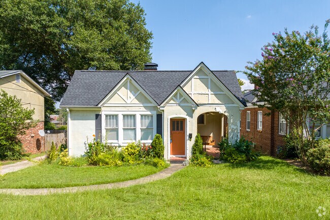 A stucco Tudor-style home sits in the heart of Midtown Augusta.