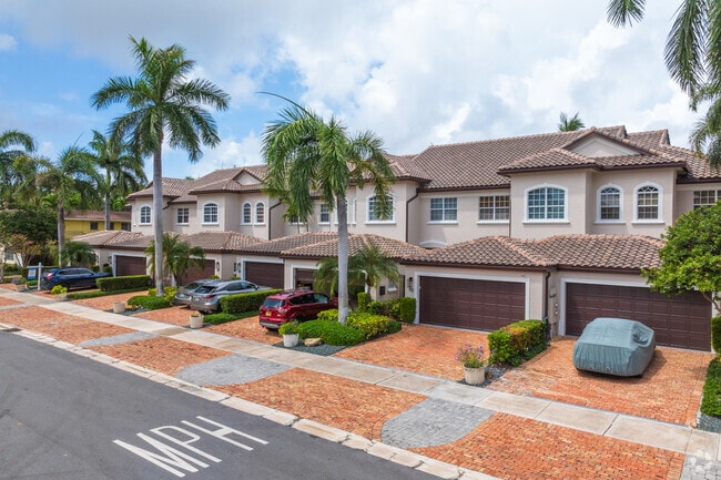 Luxury townhouses featuring garages line the streets of Hendricks Isles.