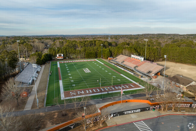 Kell High School features athletic fields for team sports.