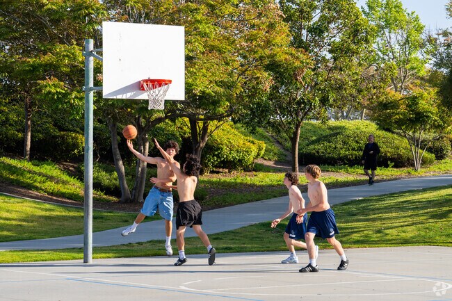 These kids are enjoying a pickup game of basketball at Simmons Family Park near Lake San Marcos.
