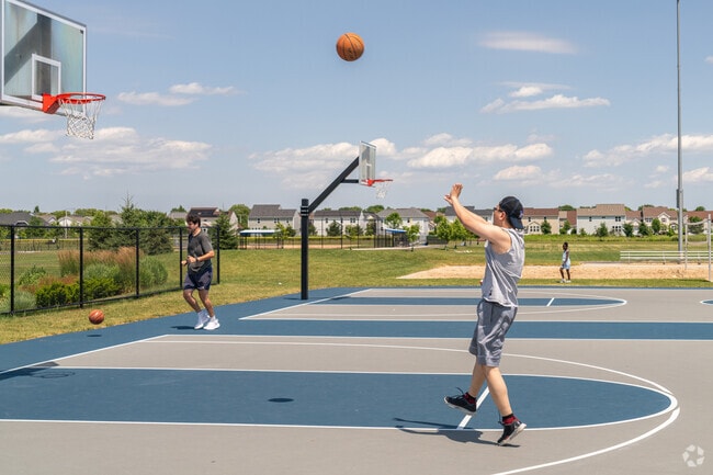Tall Grass residents can enjoy the basketball courts at Wolf's Crossing Community Park.
