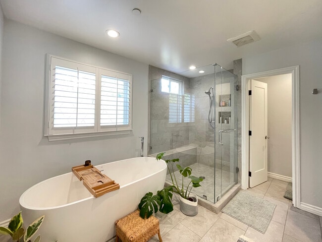 Master Bath with double sided fireplace and soaking tub