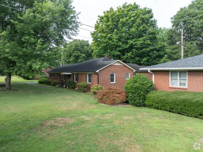 A row of brick, ranch homes in Todd Park.