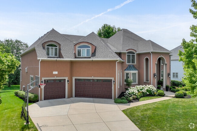 Spanish inspired homes with unique colors sit around River Run.