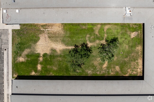 Western Hills Elementary School frames a grassy courtyard.