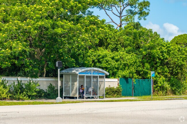 The bus stops in Willoughby are covered with seating.