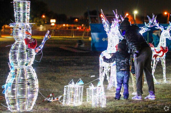 The Everman Christmas Tree Lighting sets up colorful displays around the park.