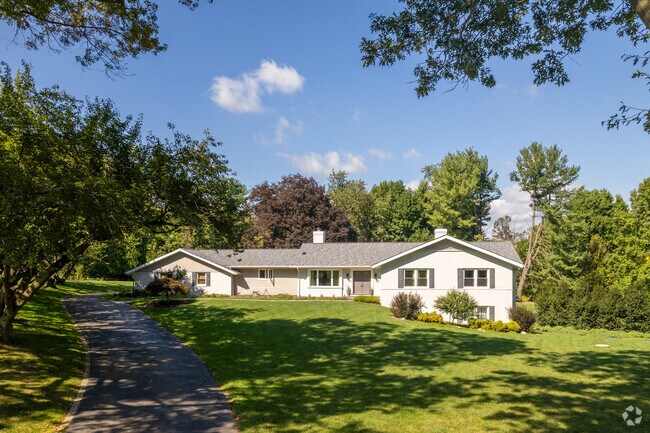 Many homes in Ashland are often constructed with polished features and sit on shaded lawns.