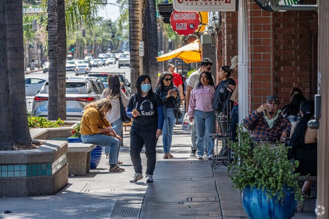 Lively storefronts on Main Street add walkable charm to Lindaraxa Park.