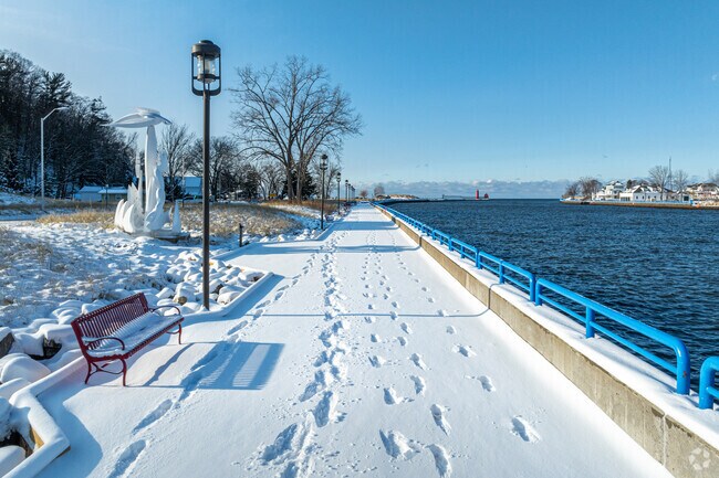 Visitors and residents of Grand Haven can enjoy a walk by the Grand River in every season.