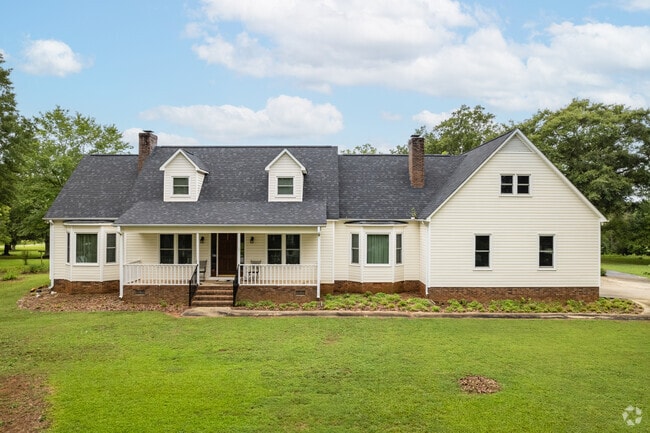 Farmhouse style houses with large front yards can be found in Moore.