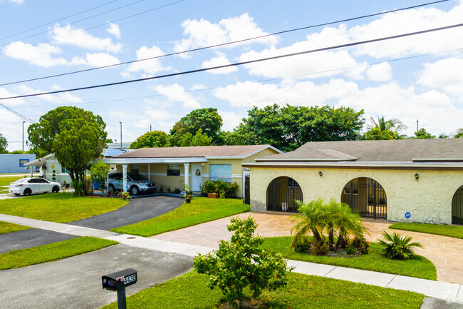 Discover the character of West Park through a row of charming ranch-style homes.