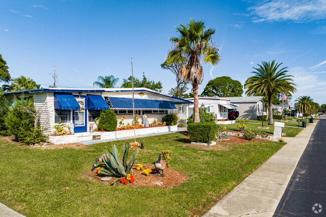 A row of color manufactured homes in Briarwood 55+ Resort.