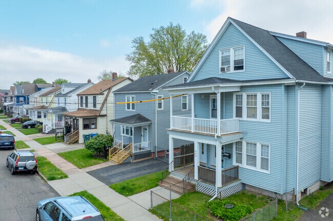 Hamden streets are lined with colorful homes and well kept sidewalks.