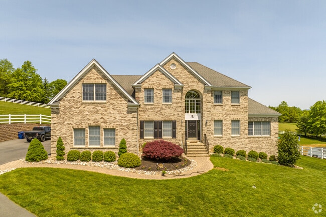 The brick colonials of Williams Township offer privacy through vast yards.