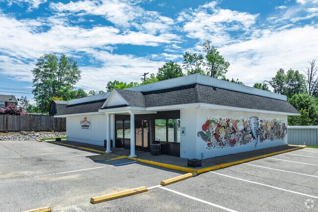 Twisted Tomato Pizza Company has 15 specialty pizzas and an arcade.