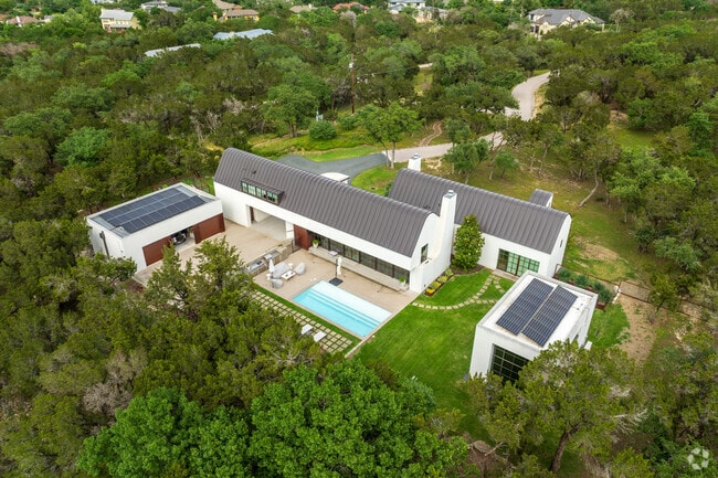 Minimalist estates rise near Lake Austin.