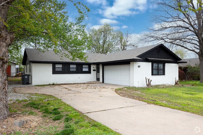 Many homes in Audubon have expansive driveways to fit multiple cars.