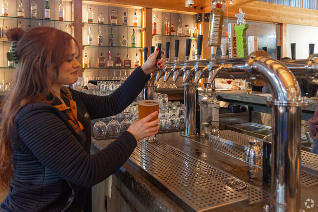 Enjoy a craft beer at Nonesuch River Brewing near Country Gardens.