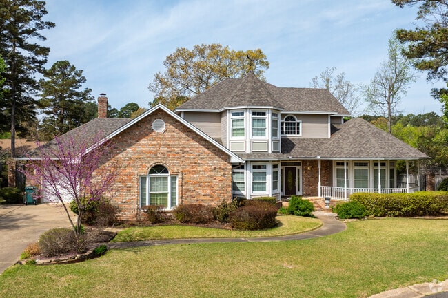 Larger homes in various styles, like a modern Victorian style home