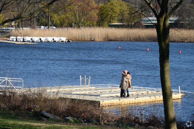 Lovers embrace on the dock in Overpeck Park near Ridgefield Park.