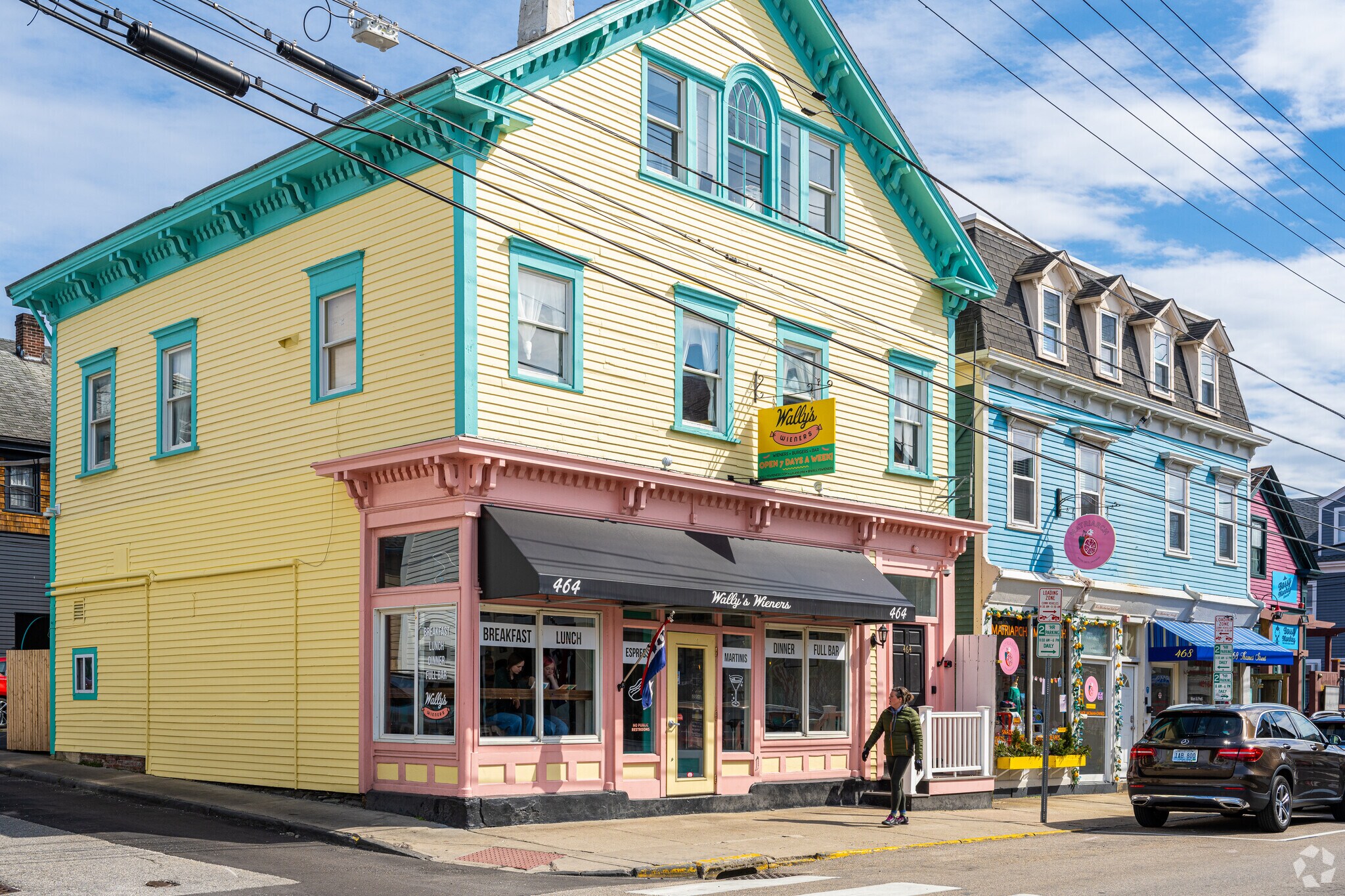 Hungry customers line the windows at Willy's Weiners on Thames St. in Fifth Ward.