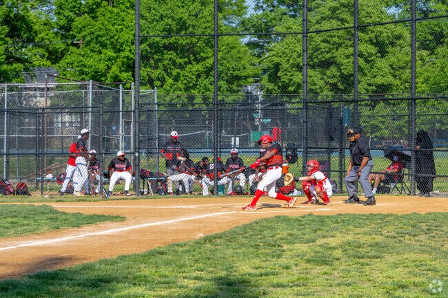 High schoolers playing baseball at Taft Field, right next to Dwight Mosley Playground.