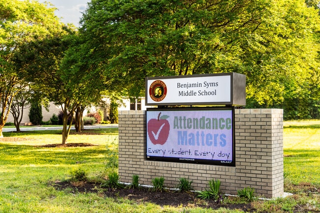 Benjamin Syms Middle School in Newport News emphasizes academic excellence, with strong performances in subjects like Geometry and Earth Science.