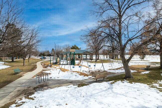 Riverside Park has a playground and swing set.