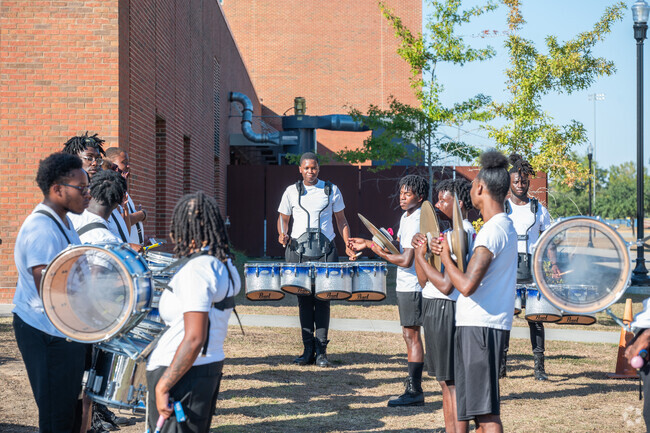 The marching band of ASU gets the students and Ragsdale residents fired up for homecoming.