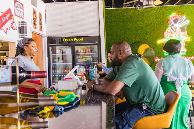 Pleasant City locals gathering at the Simmer Down Bar and Grill for a delightful meal.