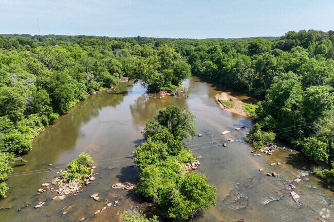 Locals enjoy the beauty of the scenic Haw River.