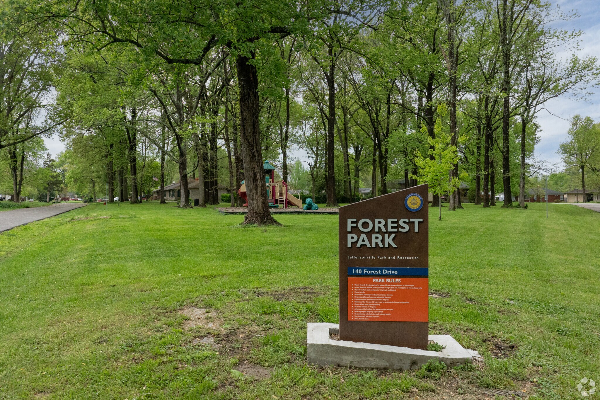 Forest Park is towered over by mature Oak trees.
