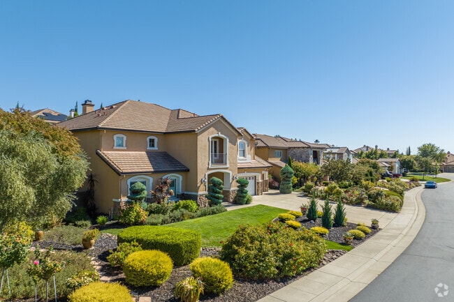 Row of Mediterranean homes are well landscaped in Verdera Village Neighborhood.