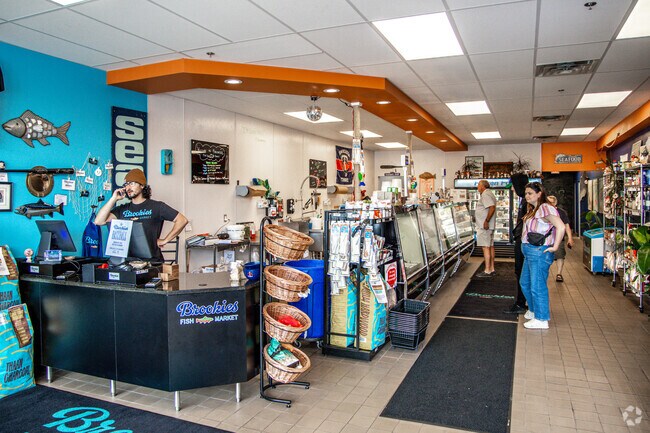 Swing past Brookies Fish Market to pick up groceries for dinner.