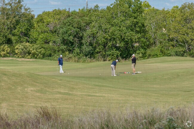 Golfers enjoy a round of golf a Timber Creek Golf Club in Friendswood.