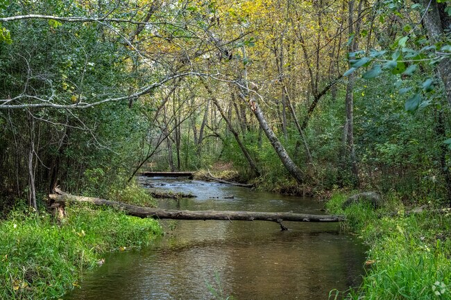 Osceola Creek flows through Schillberg Park with scenic walking trails.