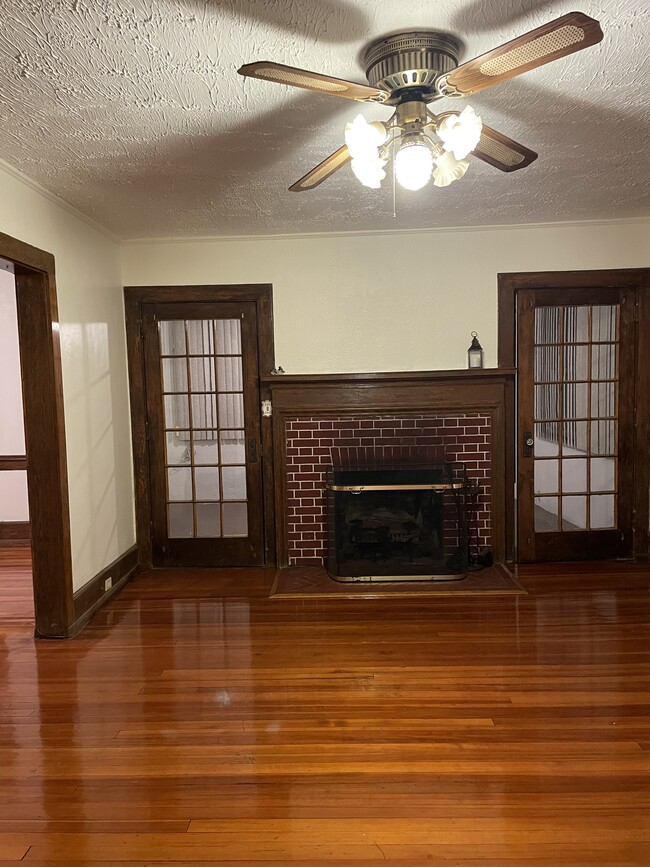 Classic fireplace and french doors