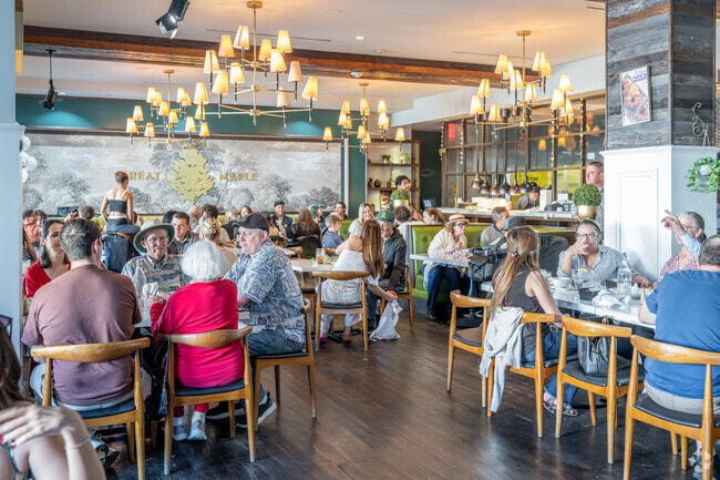 Harbor View Homes residents can head to Fashion Island for various dining options, such as Great Maple.