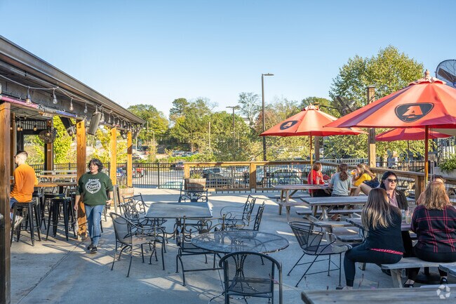 Locals relax for happy hour on the patio at Athentic Brewing in Boulevard.