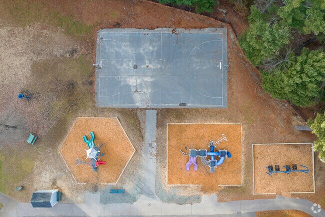 An aerial top-down view of the large play area at Martha Jones School in South Westwood, MA