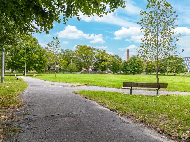 Sit on the bench and relax in Lexington Terrace at Model Park.