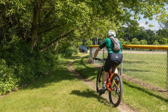 Ride the designated mountain bike trails at Carrie Janowski Memorial Athletic Park.