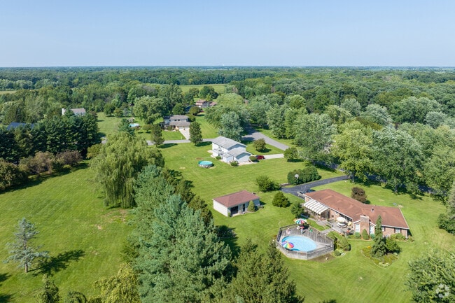 Aerial view of the large lots and homes with pools, Deep Run, Merrillville, IN.