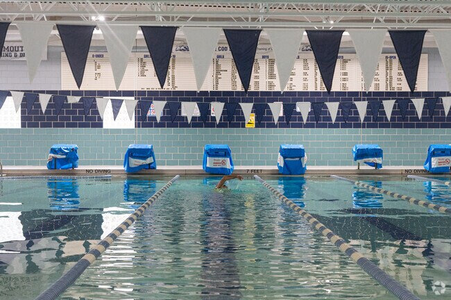 Some swim laps at the indoor pool at the Village Sports Club in Pinehills Golf Club.