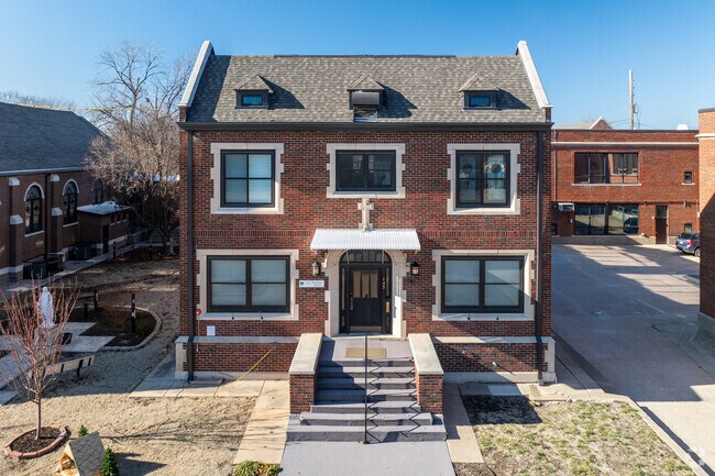The building for St. Joseph Catholic School is made of red brick.
