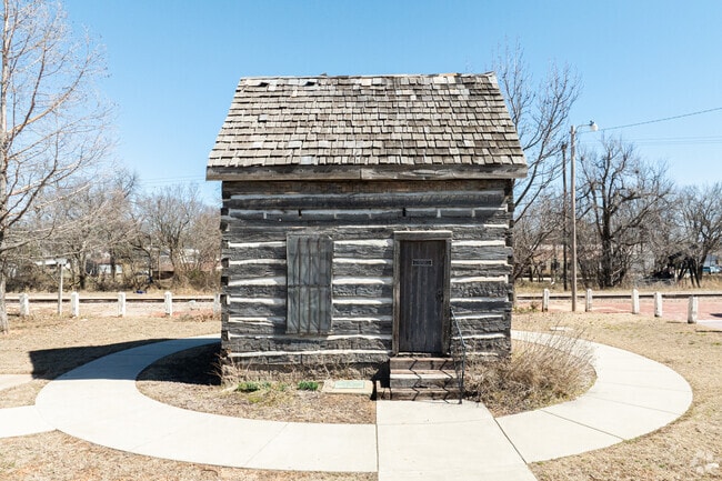 Located behind Shawnee's train station is the historic Beard Cabin which is one of the oldest structures in the state.