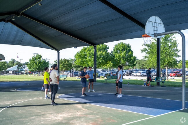 Milburn Park has a covered basketball court by Ranch at Cypress Creek.