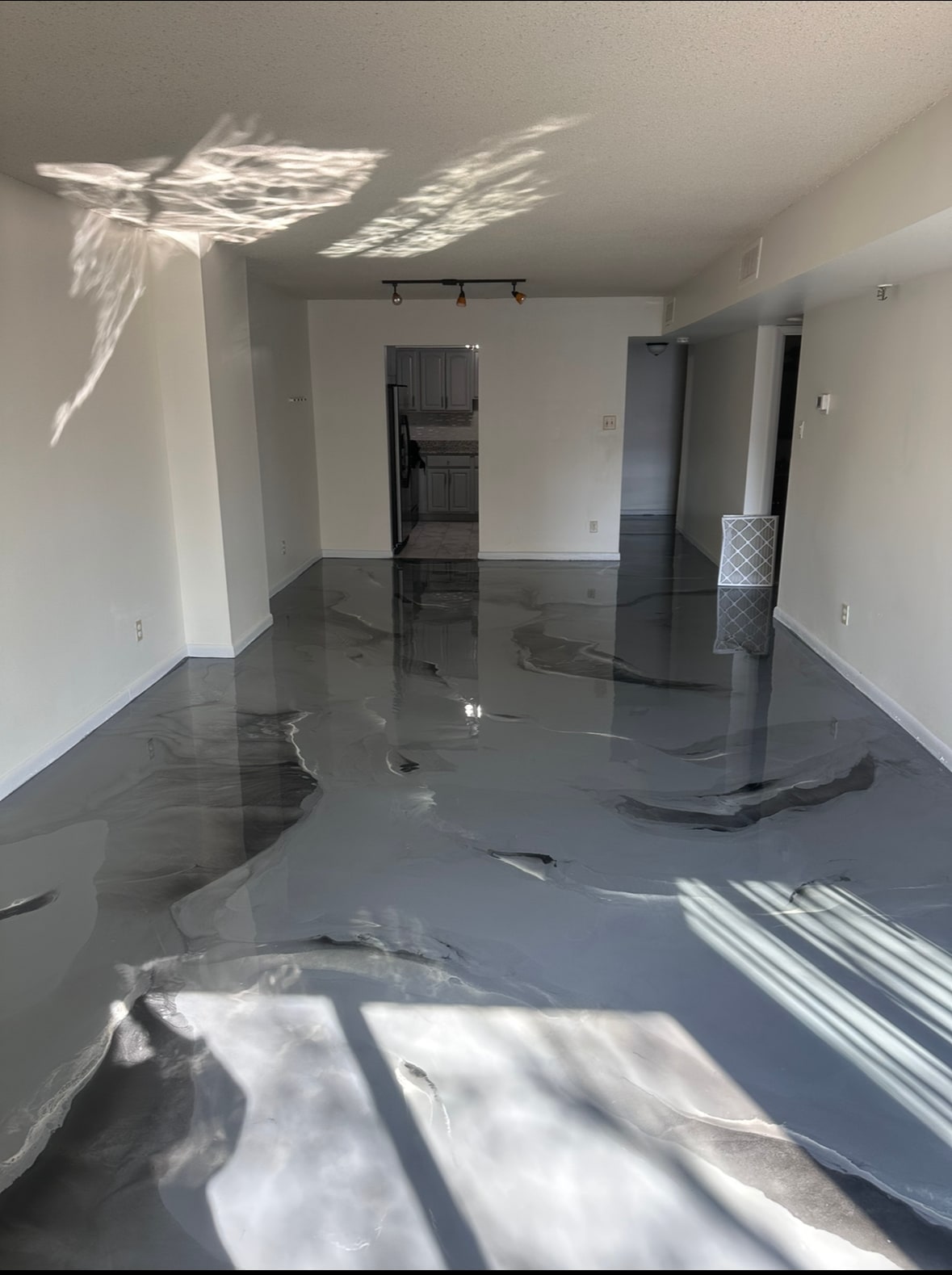 Living/ Dinning Area: With New epoxy flooring